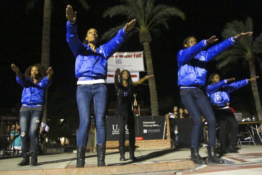Ernie Somoza /  Arizona Daily Wildcat

Soririties and fraternities compete in the yearly step, stroll and salute on the UA mall Friday evening. Students competed for a trophy and bragging rights.

