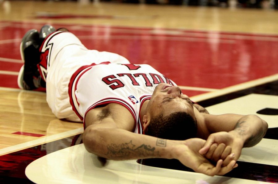The Chicago Bulls' Derrick Rose is down after he injured his knee in the closing minutes of the fourth quarter against the Philadelphia 76ers in Game 1 of the Eastern Conference first-round series at the United Center in Chicago, Illinois, on Saturday April 28, 2012. The Bulls won, 103-91, but Rose's season is over. (Ron Cortes/Philadelphia Inquirer/MCT)