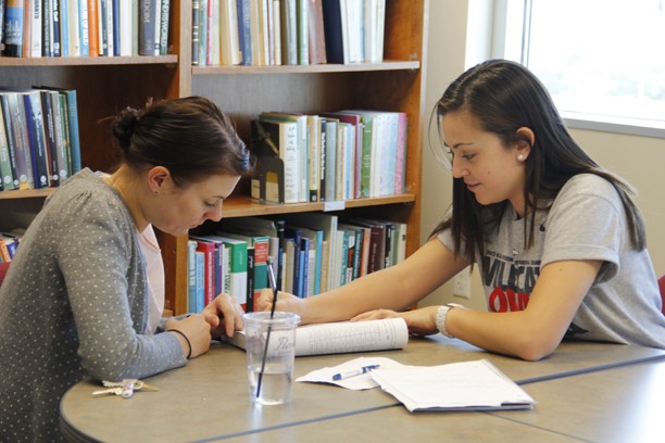 Noelle R. Haro-Gomez/Arizona Daily Wildcat

Carissa Pastuch, left, is tutoring Emily Smith, right. Smith is in the Airforce ROTC