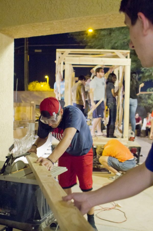 Tyler Besh /  Arizona Daily Wildcat

Engineering students build homecoming float