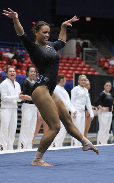 Kelsee Becker /  Arizona Daily Wildcat

Arizona __(insert year, Name)__ performs her floor routine on Friday against The University of Utah. Although Arizona lost to Utes by 0.525, they posted a season high of 196.075.