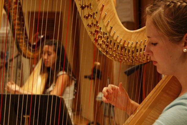 Keith Hickman-Perfetti/ Arizona Daily Wildcat

From left, Liska Yamada, 21, and Bethany Roper, 19, perform on harps in the UA School of Musics recording room on Sept. 7 2011. They are part of Harp Fusion, a harp performance group in the school of music, and are being recorded for An Arizona Christmas the groups seventh album.