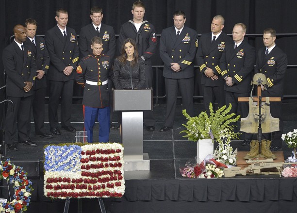 Taya Kyle addresses the audience at the funeral of her husband, Chris Kyle, at Cowboys Stadium in Arlington, Texas, Monday, February 11, 2013. Kyle was a highly decorated former Navy SEAL sniper who was shot and killed at a shooting range last week. (Max Faulkner/Fort Worth Star-Telegram/MCT)