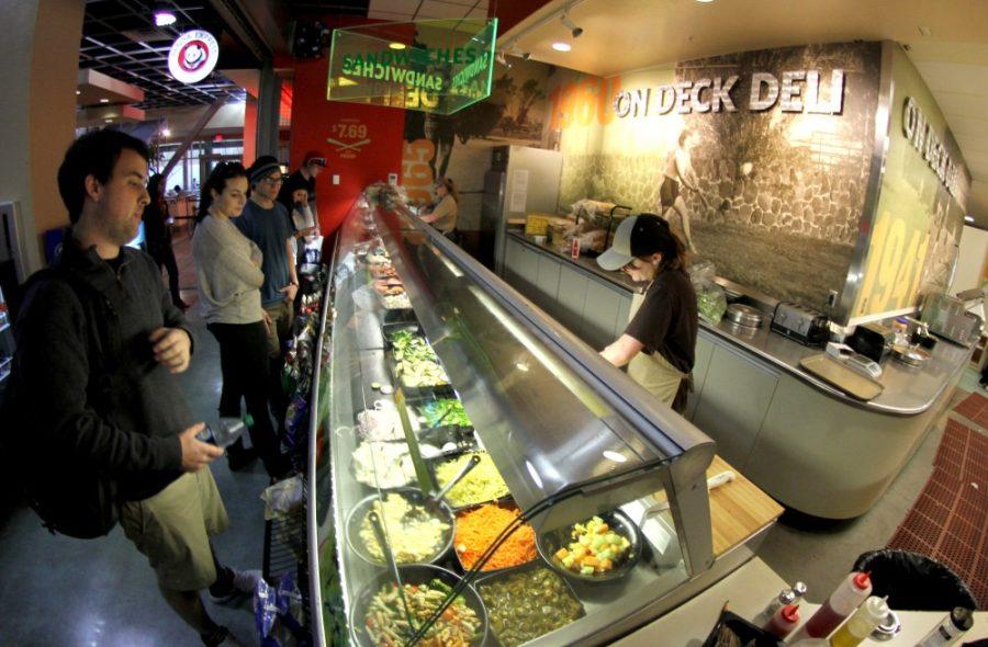 Kelsee Becker /  Arizona Daily Wildcat

Students order sandwiches at On Deck Deli between classes. On Deck Deli follows an assembly line process, allowing students to customize their order with a wide selection of breads, meats, cheese, veggies, and dressings.
