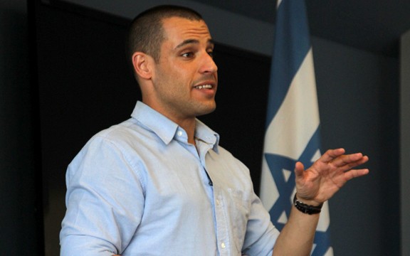 Kevin Brost /  Arizona Daily Wildcat

Adam (last name was withheld), speaks about his time and experiences served in the Israeli army and the current state of the nation today at the Hillel center on Tuesday.