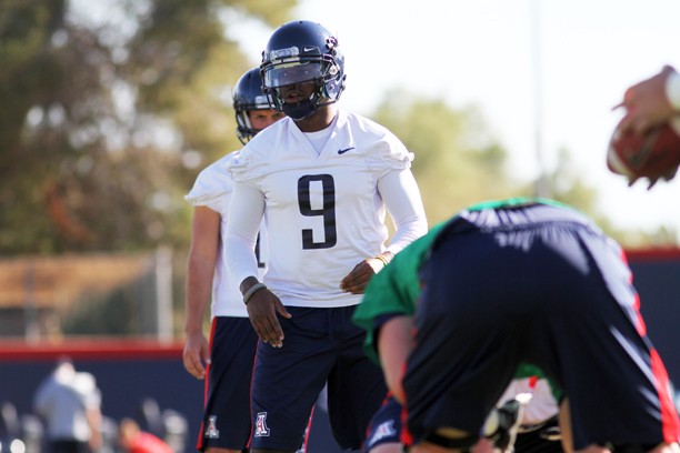 Kelsee Becker  /  Arizona Daily Wildcat

#9 Quarterback Javelle Allen practices for the upcoming Fall 2013 season on Monday afternoon. UA Football began their spring practices this past Saturday.