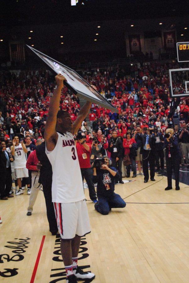 	Kevin Parrom is honored after a 15-point win over Arizona State on Saturday. March 9, 2013. 
