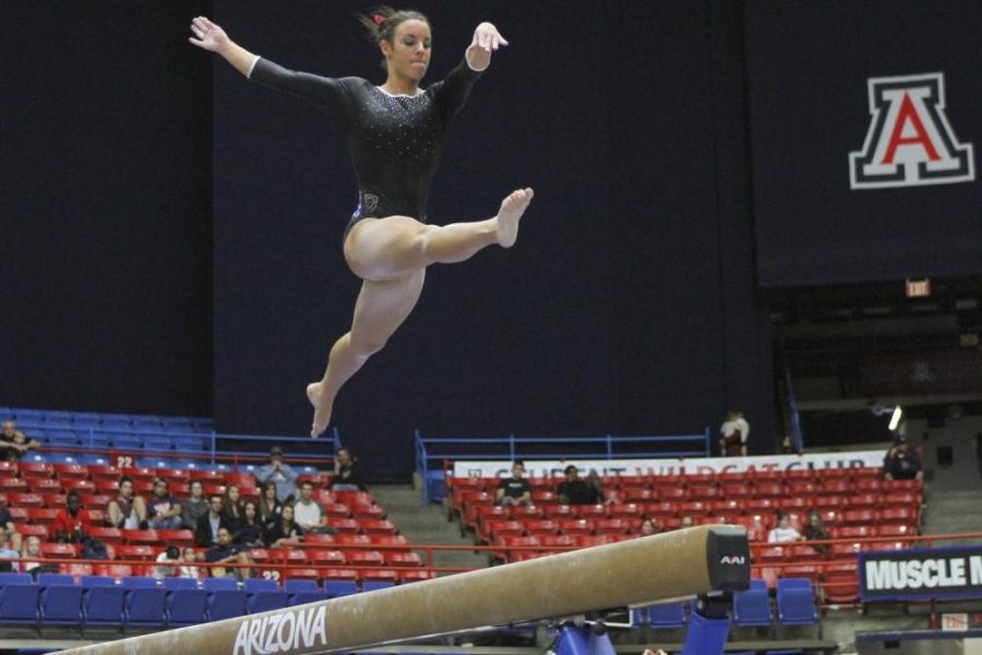 Kelsee+Becker+%2F++Arizona+Daily+Wildcat%0A%0AArizona+Senior+Aubree+Cristello+performs+her+balance+beam+routine+on+Friday+against+The+University+of+Utah.+Although+Arizona+lost+to+Utes+by+0.525%2C+they+posted+a+season+high+of+196.075.