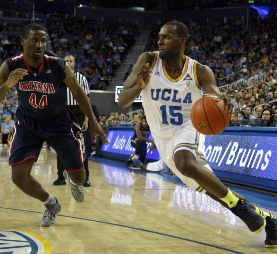 UCLAs Shabazz Muhammad, right, drives to the hoop as Arizonas Solomon Hill defends in the second half at Pauley Pavilion in Los Angeles, California, on Saturday, March 2, 2013. UCLA won, 74-69. (Allen J. Schaben/Los Angeles Times/MCT)