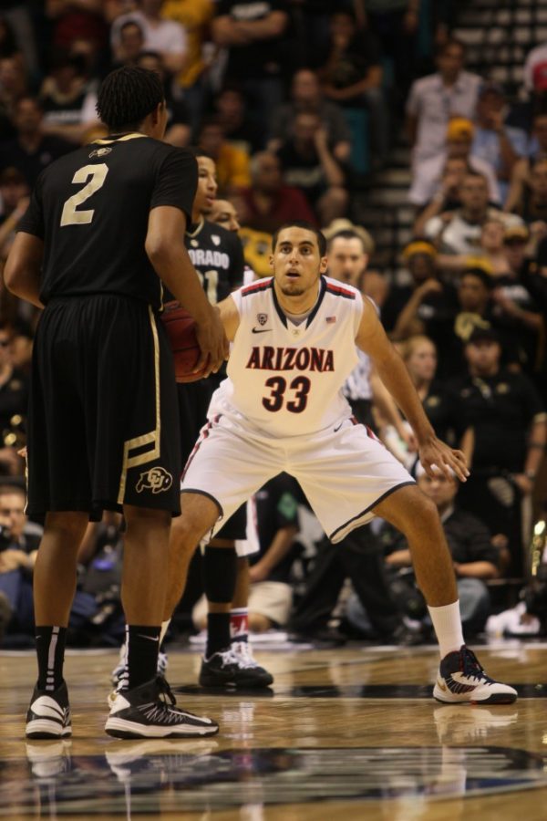	Forward Grant Jerrett plays defense against Colorado in the Pac-12 Tournament on March 14, 2013 in Las Vegas. 