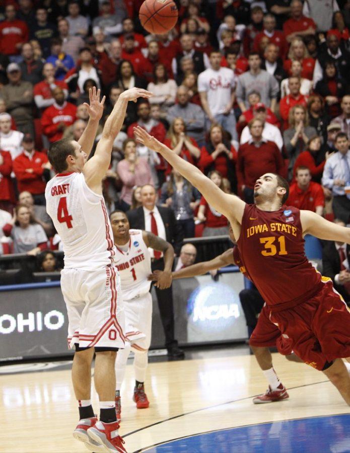 Ohio State guard Aaron Craft (4) shoots and hits the game-winning basket over Iowa State forward Georges Niang (31) late in the second half of a third-round game in the NCAA Tournament at Dayton Arena in Dayton, Ohio, Sunday, March 24, 2013. Ohio State defeated Iowa State,  78-75. (Terry Gilliam/MCT)
