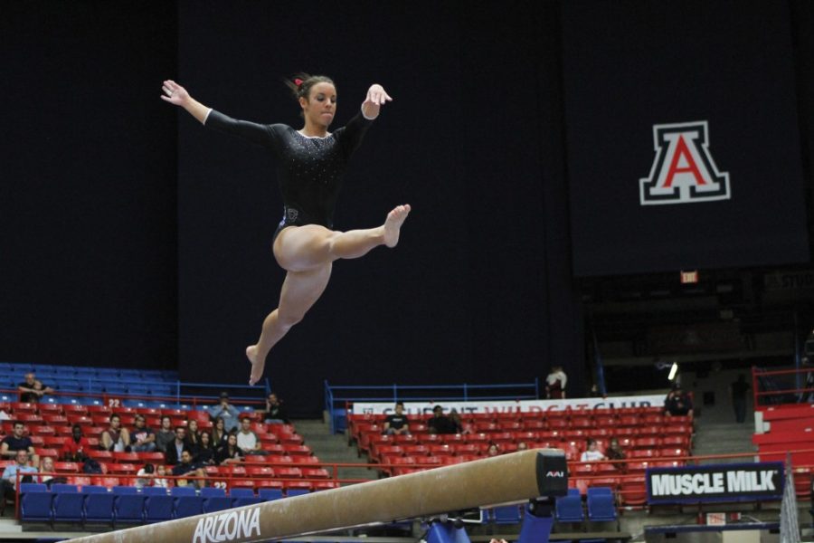 Kelsee Becker /  Arizona Daily Wildcat

Arizona Senior Aubree Cristello performs her balance beam routine on Friday against The University of Utah. Although Arizona lost to Utes by 0.525, they posted a season high of 196.075.