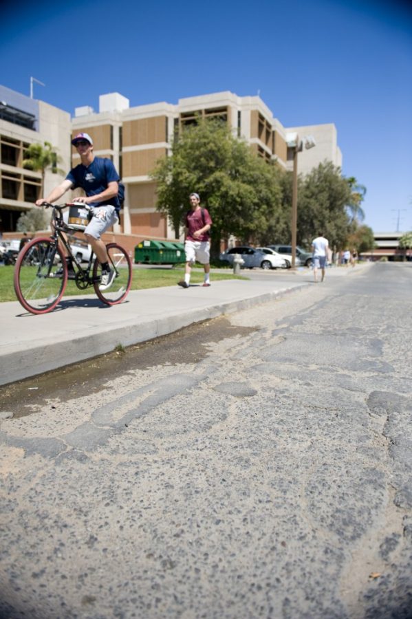 Tyler Besh/Arizona Daily Wildcat

The University is working on many campus repairs including a project, after graduation, that will repave 4th street, between Cherry and Highland road.