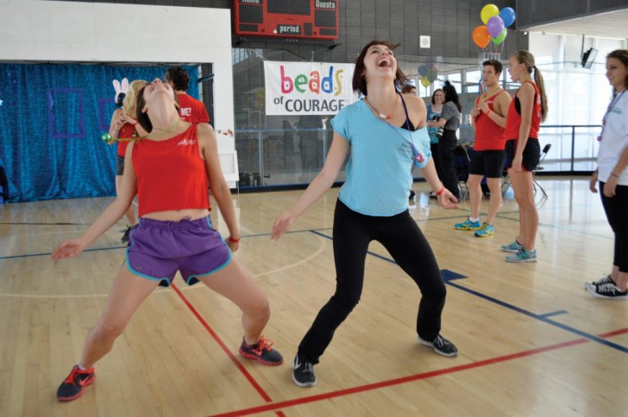 Ryan Revock / Arizona Daily Wildcat

Alex Doyle (left), a dance freshman, and Alex Yonkovich (right), a dance sophomore, dance at the Courage in Motion Dance Marathon on Saturday.  The marathon benefited the charity Beads of Courage.