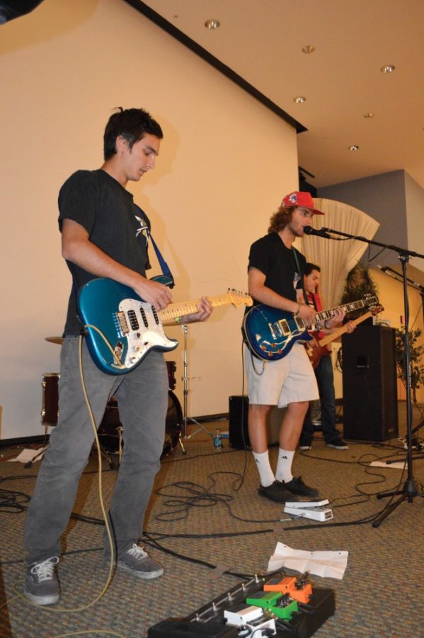 Ryan Revock / Arizona Daily Wildcat

Nik Gelo (left) and Connor Shea (right) from the band Something Like Seduction preform at the Up til Dawn event.  The event helps the St. Jude Childrens Research Hospital.