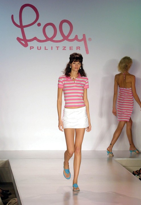 KRT FASHION STORY SLUGGED: NYFASHION-LILLYPULITZER KRT PHOTOGRAPH BY TODD PLITT/KRT (September 21) NEW YORK, NY--  A model walks the runway wearing a pink fun stripe pique shrunken polo, love court skirt with pink and blue piping and havana blue dance shoe during the Lilly Pulitzer Spring 2003 fashion show in New York City on September 21, 2002. (KRT) NC KD BL 2002 (Vert) (Digital image) (Diversity) (lde) 