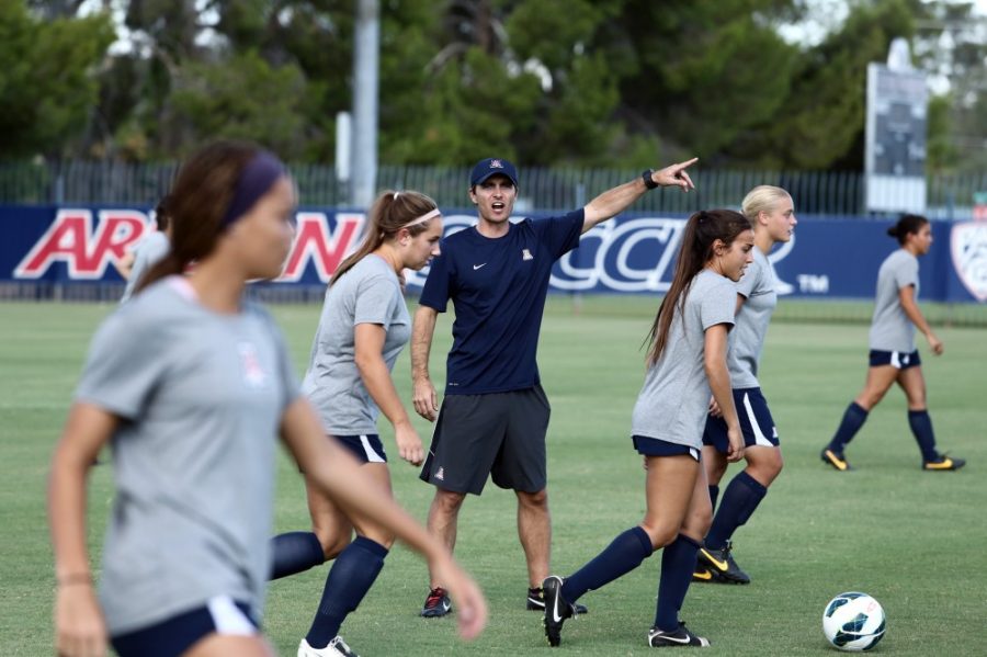 Tyler Besh // The Daily Wildcat

UA Soccer Coach Tony Amato directs the players during practice on Monday, Aug. 26, 2013.  