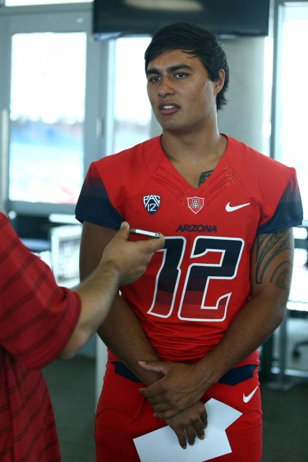 Tyler Besh / Arizona Summer Wildcat

Freshman quarterback, Anu Solomon, wears one of the new UA football unifroms at the Arizona football media day held in the new Lowell-Stevens Football Facility August 18, 2013.