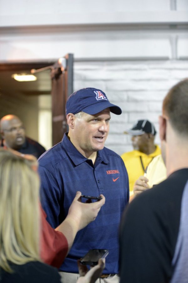 	Coach Rich Rodriguez speaks with the media following the Wildcat 58-13 victory UNLV on Saturday.
