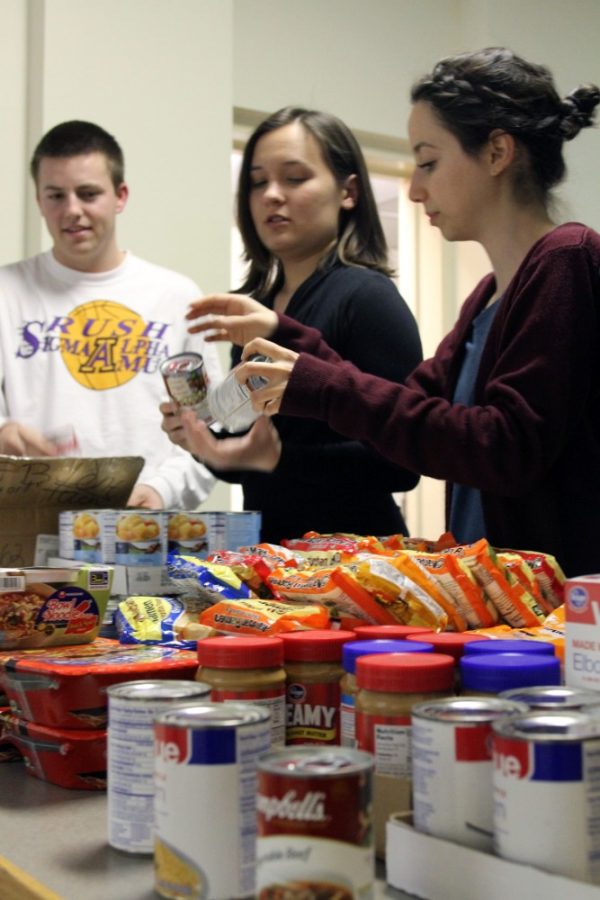 File Photo /  Arizona Daily Wildcat

The UA Campus Pantry Board organize donated goods before the Feb. 1 opening. Similar to other campuses across the country, UA Campus Pantry is an emergency food pantry available for those in need within the UA Community.