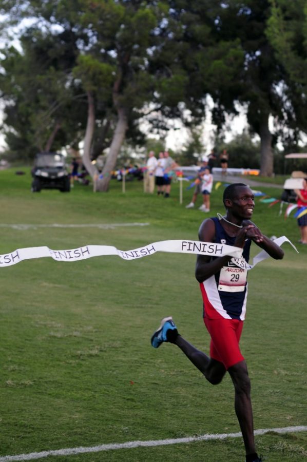 Tyler Baker / Arizona Daily Wildcat

Collins Kibet crosses the finish line on Sept. 20, 2013.
