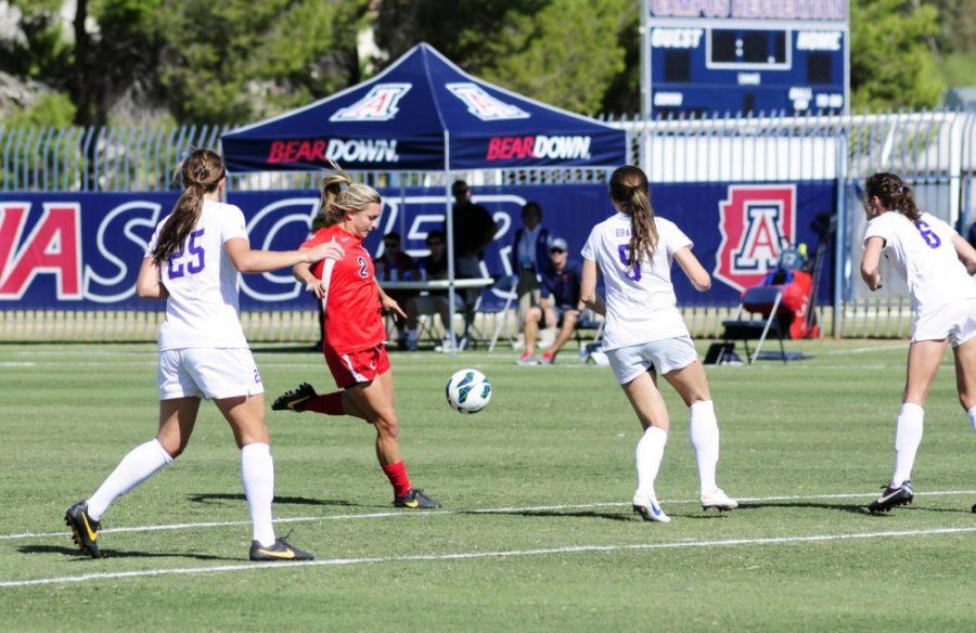 Tyler Baker / The Daily Wildcat

UA Junior Alexandra Doller scores against the Washington Huskies during the second half of the game. UA Soccer tied Washington 2-2 in double overtime Sunday afternoon.

