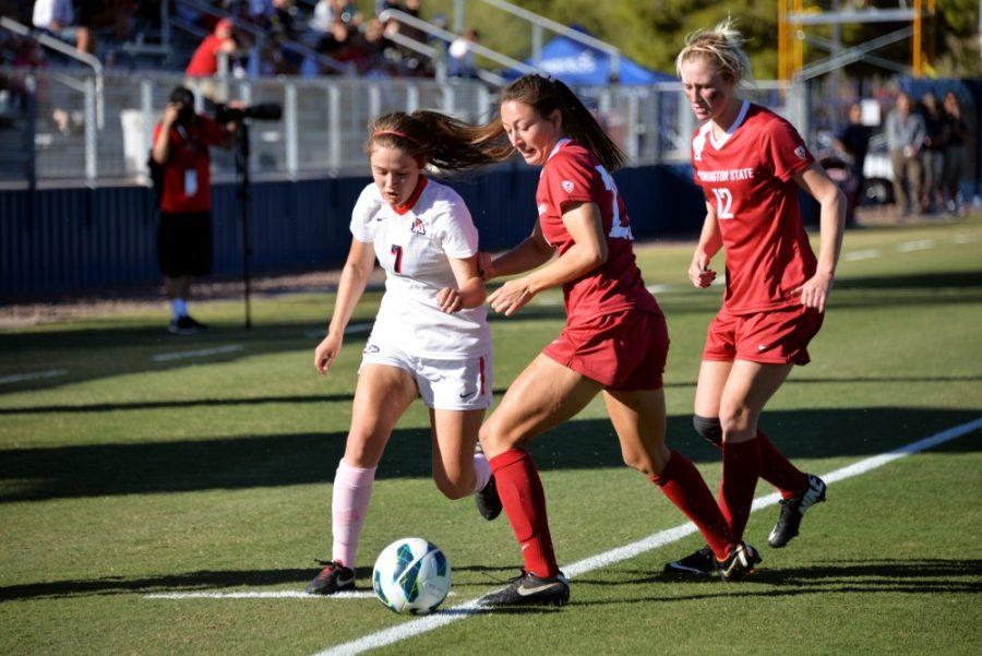 Alexander Plaumann/ The Daily Wildcat

Hannah Wong trys to keep the ball in bounds against Washington State on Friday. 