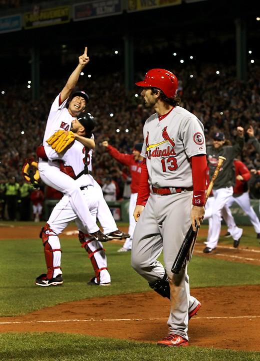 The+St.+Louis+Cardinals%26apos%3B+Matt+Carpenter%2C+right%2C+walks+off+after+striking+out+to+end+the+game+as+the+the+Boston+Red+Sox+begin+to+celebrate+at+Fenway+Park+in+Boston%2C+Massachusetts%2C+on+Wednesday%2C+October+30%2C+2013.+The+Red+Sox+won%2C+6-1%2C+to+clinch+the+championship.+%28Robert+Cohen%2FSt.+Louis+Post-Dispatch%2FMCT%29