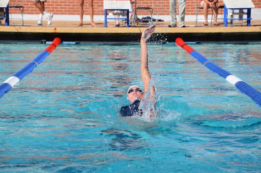 Rebecca Noble/ The Daily Wildcat

Bonnie Brandon swims the backstroke against USC on Saturday at home.  