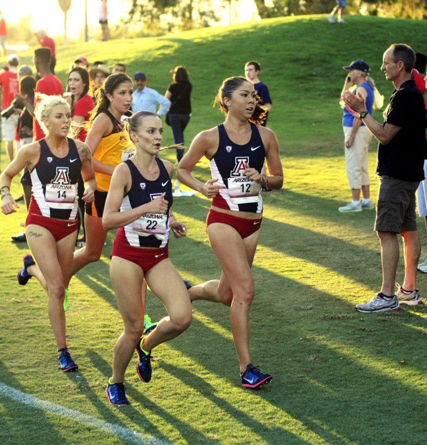 Tyler Baker / The Daily Wildcat

Hanna Peterson (front left) runs in the Dave Murray Invitational on Sept. 20, in Tucson.  