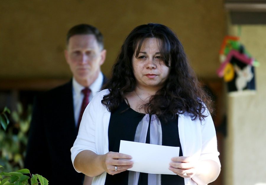 Ana Hernandez, widow of slain Transportation Safety Administration officer Gerardo Hernandez, comes out of her Porter Ranch, California, home to read a statement to reporters gathered outside on Saturday, November 2, 2013. Gerardo Hernandez was killed Friday when a man went on a shooting rampage at Los Angeles International Airport. (Luis Sinco/Los Angeles Times/MCT)