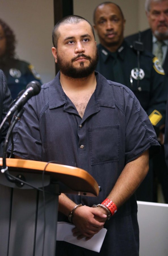 George+Zimmerman%2C+the+acquitted+shooter+in+the+death+of+Trayvon+Martin%2C+faces+a+Seminole+circuit+judge%2C+Tuesday%2C+Nov.+19%2C+2013%2C+in+Sanford%2C+Fla.+during+a+first-appearance+hearing+on+charges+including+aggravated+assault+stemming+from+a+fight+with+his+girlfriend.+%28Joe+Burbank%2FOrlando+Sentinel%2FMCT%29