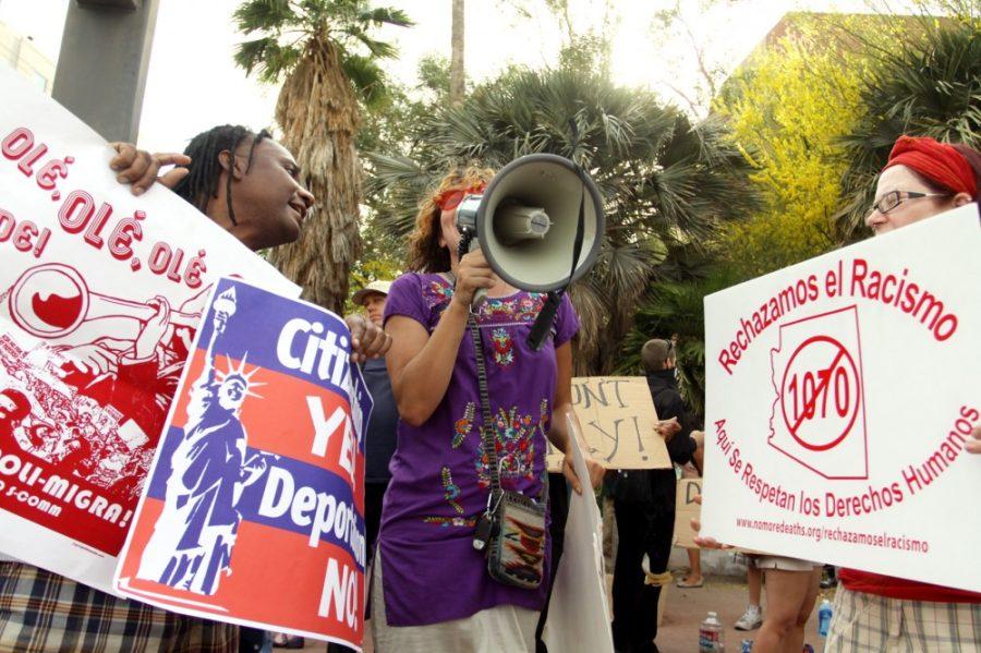Will Ferguson / Arizona Daily Wildcat

Protesters gathered in front of the Tucson State building, 400 W. Congress St., to protest Arizonas SB 1070. Arguements against the bill are currently being heard in the United States Supreme Court. Photos were taken on Wednesday, April, 25, 2012. 
