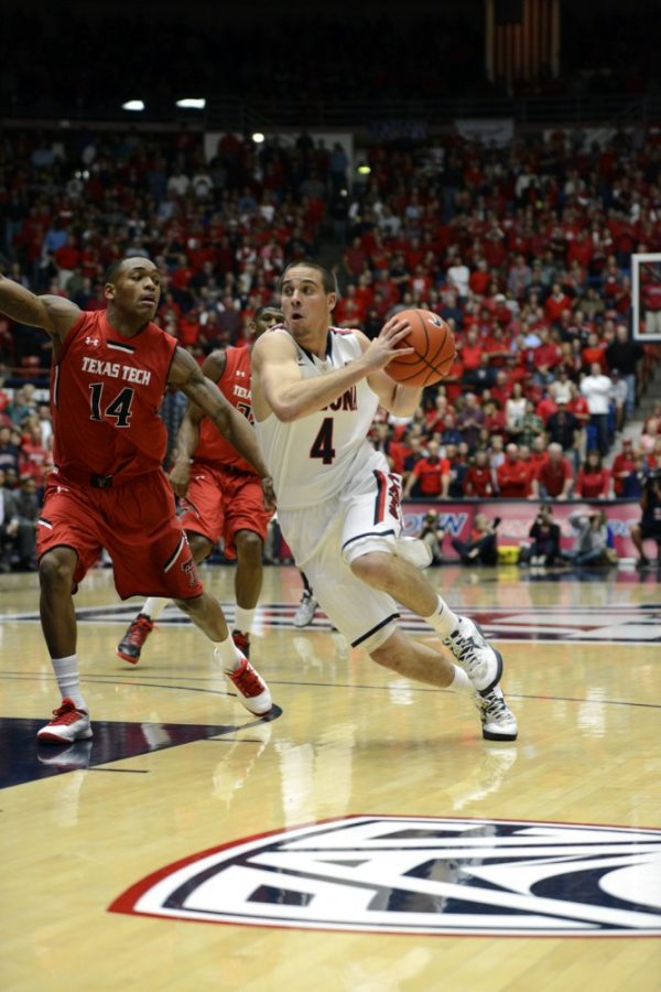 Ryan+Revock+%2F+The+Daily+Wildcat%0A%0AUA+junior+guard+T.J.+McConnell+drives+the+ball+towards+the+net+against+Texas+Tech+on+Tuesday+at+the+McKale+Center.++