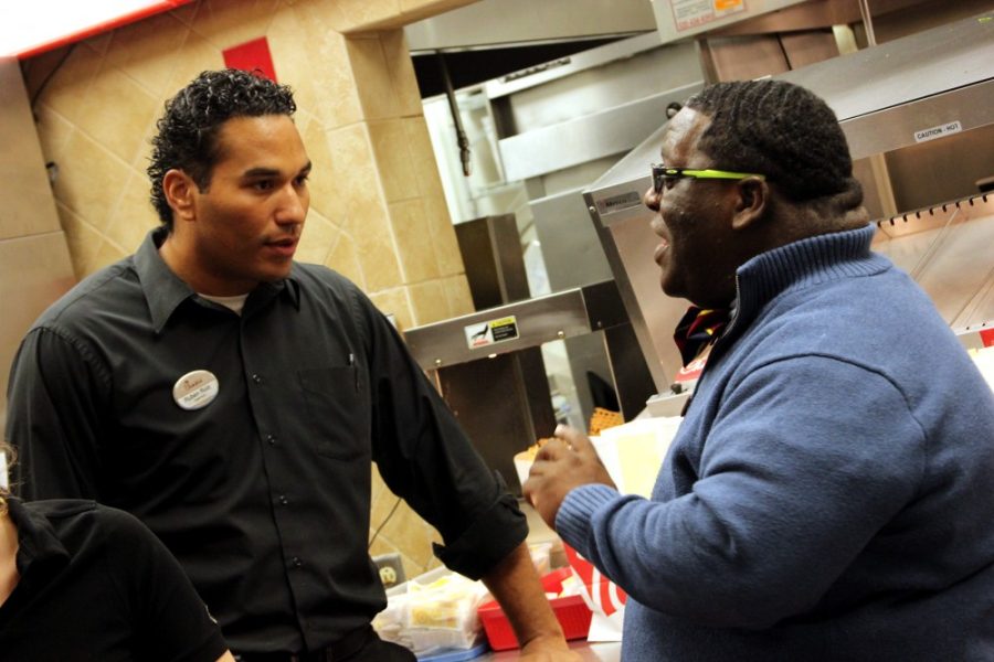 Rebecca Marie Sasnett / The Daily Wildcat

Jason Tolliver, director of Arizona Student Unions, talks to Ruben Ruiz, Chick-fil-a supervisor, at Chick-fil-a after a busy lunch rush Wednesday, Nov. 27, 2013. Tolliver is the new director of Arizona Student Unions.