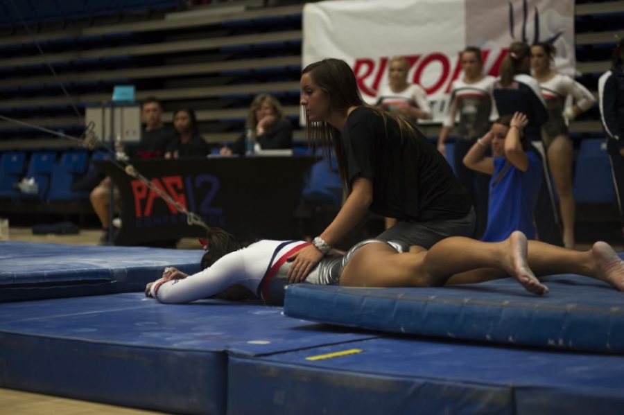 Carlos+Herrera%2F+The+Daily+Wildcat%0A%0AAt+the+Gymcats+meet+against+No.+1+Oklahoma+last+Saturday%2C+senior+leader+Jordan+Williams+was+treated+after+injuring+her+upper+body+after+falling+from+the+bars.+%0A
