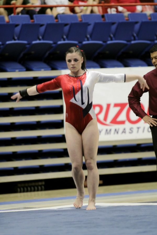 File+Photo%2F+The+Daily+Wildcat%0A%0AUA+junior+all-around+Kristin+Klarenbach+starts+her+routine+on+the+floor+during+the+UA+vs.+ASU+gymnastics+meet+Saturday%2C+March+2%2C+2013.+UA+placed+first+over+ASU+196.500-193.850.