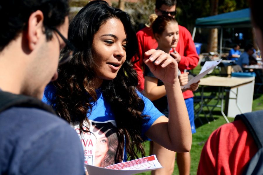 Steve Nguyen/The Daly Wildcat

Ahva Sadeghi, Associated Students of the University of Arizona  presidential candidate, speaks to passing students about her campaign on the UA Mall on Wednesday. If elected, Sadeghi would be the first female, non-greek, ASUA president in 16 years. 