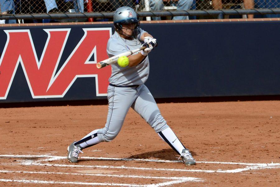 Tyler Baker / The Daily Wildcat

Freshman infielder Mo Mercado hits the ball during Arizona Softballs 14-2 win against Southern Mississippi at the Hillenbrand Memorial Stadium on Saturday.