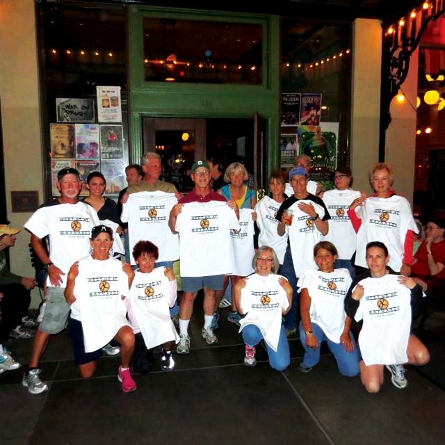 Courtesy of Meet me at Maynards

Participants gather to take a picture after the Meet me at Maynard walk on Monday. This event is a noncompetitive run/walk where participants can enjoy the history and food and drink Tucson has to offer.                                        