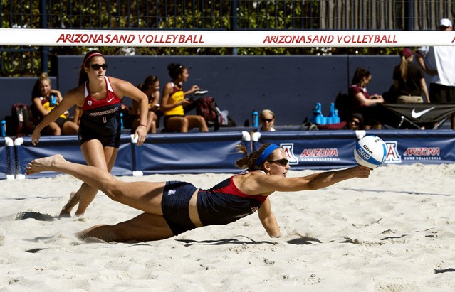 Carlos Herrera/The Daily Wildcat

Junior Rachel Rhoades dives to keep the ball in play during Arizonas 3-2 loss against Grand Canyon University at the Arizona Sand Volleyball Courts on Saturday.  