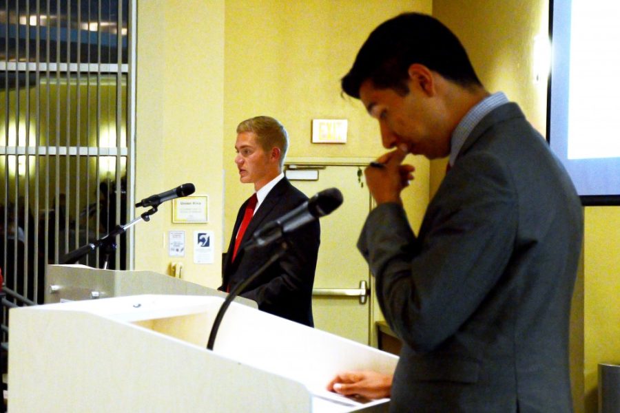 Steve Nguyen/The Daily Wildcat

Taylor Ashton(left) and Issac Ortega (right) speak on their views in the ASUA executive debate in the SUMC Kiva Room on Sunday, March 9th at 7pm.