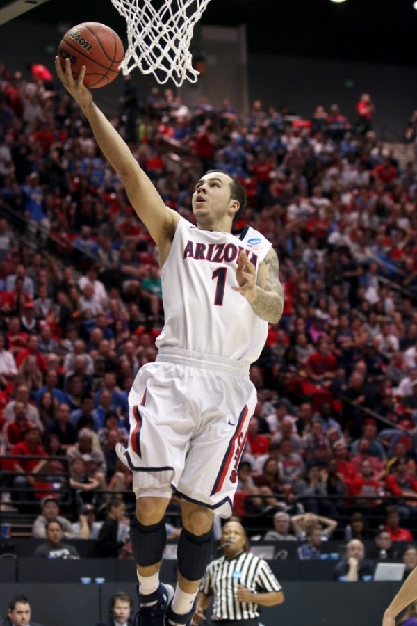 %09After+a+breakaway%2C+Arizona+sophomore+guard+Gabe+York+%281%29+lays+the+ball+up+during+Arizona%26%238217%3Bs+84-61+victory+against+Gonzaga+in+the+NCAA+Tournament+in+Viejas+Arena+in+San+Diego.+Arizona+reached+the+sweet+sixteen+for+the+second+year+in+a+row.