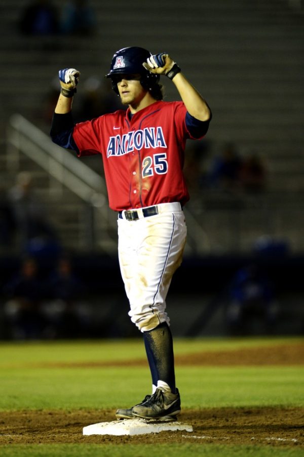 Carlos Herrera / The Daily Wildcat

Sophomore Scott Kingery makes it to the base during Arizonas 14-2 win against Air Force at Hi Corbett Field on Tuesday.
