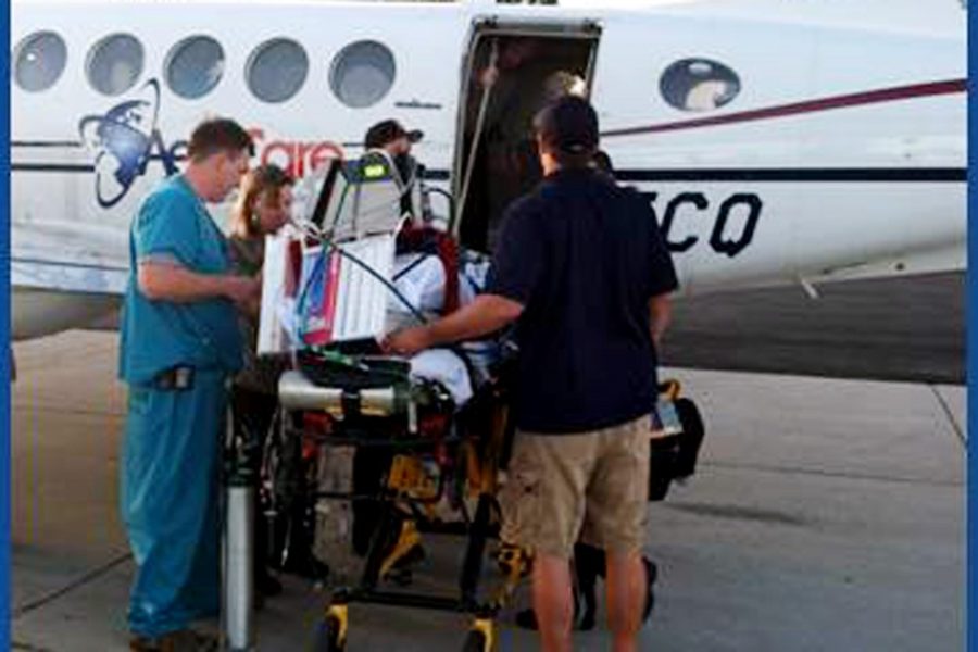	Courtesy of Jess Thompson

	The UA’s ECMO team load a patient into a plane to be transported to UAMC for further treatment. Doctors at the University of Arizona Medical Center have treated 10H1N1 patients using ECMO this season.