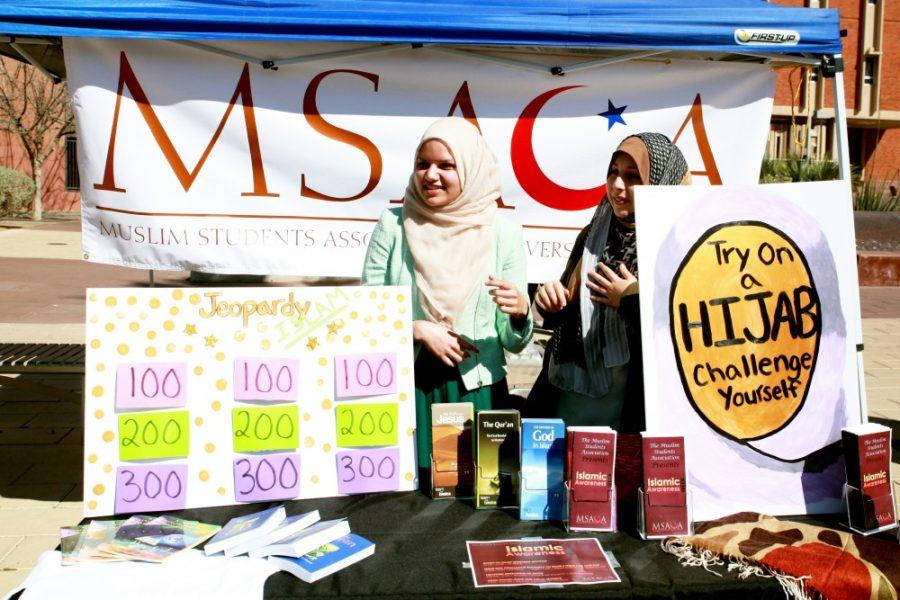 Shane Bekian / The Daily Wildcat

Sumaiyya Zehri (left), a pre-med senior, and Sarah Hemzawi (right), a pre-med sophomore, run the MSACA   booth for Islamic Awareness Week on the UA mall on Wednesday.