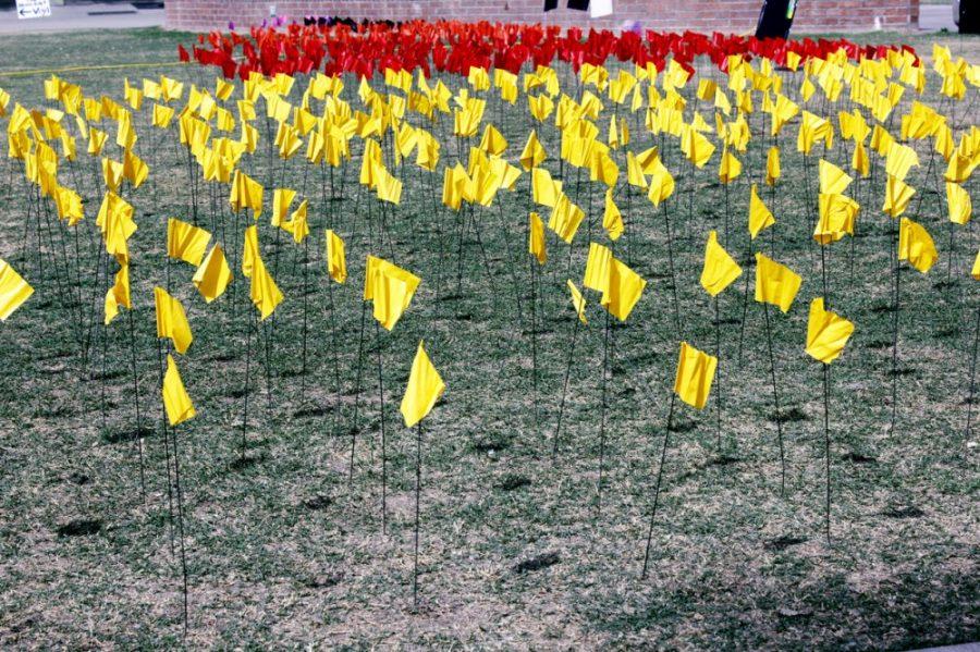 Jordin OConnor / Arizona Daily Wildcat

Flags are placed on the UA Mall March 20th in rememberance of lives lost during the Holocaust. Each color flag represents an ethic group that was killed during the Holocaust.
Holocaust memorial on the mall, March 20th.

