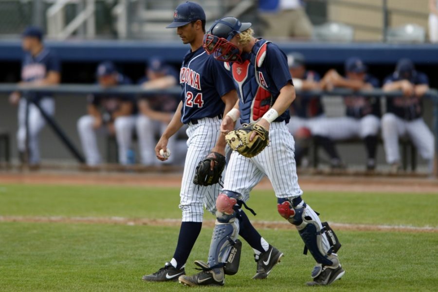 Carlos Herrera / The Daily Wildcat


Junior pitcher Tyler Parmenter (2$) and Junior catcher Riley Smith (6)walk to the mount towards the end of Arizonas 11-0 loss to Oregon State on Sunday at Hi Corbett Field.