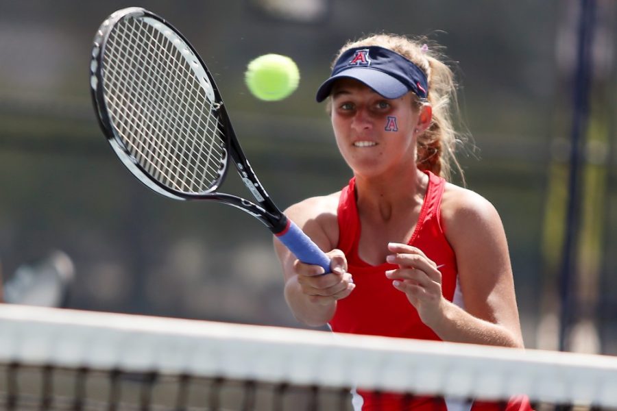 	Freshman Lauren Marker hits the ball during Arizona’s 4-2 win against ASU on April 19 at LaNelle Robson Tennis Center. Arizona women’s tennis finished the Pac-12 Championships on Friday after two doubles teams made it to the quarterfinals, before both fell to their respective opponents.