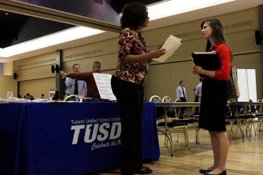 	Bonnie Bordner, art education senior, talks with Tracey McGhee, senior HR coordinator for Tucson Unified School District, about job opportunities with TUSD at UA Career Services’ Career Day on Tuesday. Some students decide to take a year or more off during the school year or in between high school and college. 